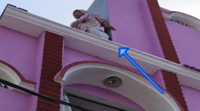 A woman harassed by a moneylender threatened to commit suicide by jumping from the roof